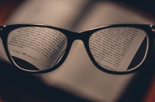 Glasses with text in focus