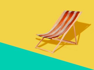 Deck chair on yellow background