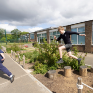 ‘It’s put the joy levels up’: the flood-prone London school with a climate-adapted playground
